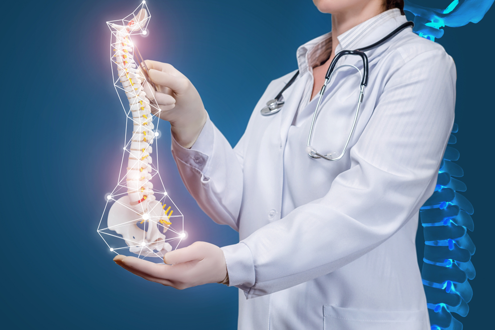 Physiotherapist_holding_spine