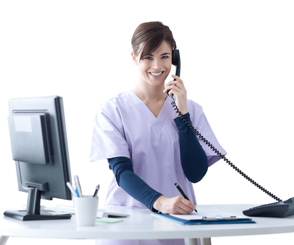 Nurse at a desk talking on the phone and taking notes